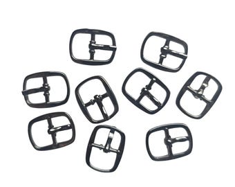 Pequeñas piezas metálicas: hebillas, cierres, anillas - precio por pieza