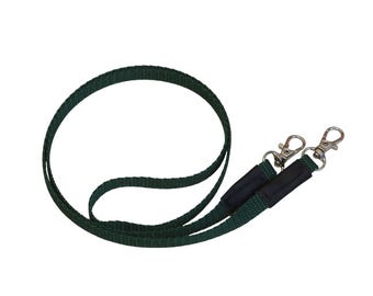 May include: A dark green lanyard made of woven fabric featuring two black rectangular connectors and two silver-toned metal lobster claw clasps at the ends. The strap is looped in a circular shape against a plain white background.