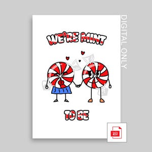 May include: A white card with a red and white peppermint candy couple holding hands. The text "We're Mint to Be" is written on the card.