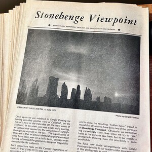 May include: A black and white photo of a halo around a group of buildings. The photo is from the publication "Stonehenge Viewpoint" and is captioned "Callanish Halo, 8:00 PM, 13 June 1978."