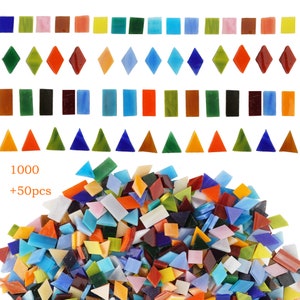 May include: A large pile of colorful glass mosaic tiles in various shapes, including squares, diamonds, and triangles. The tiles are arranged in a random pattern and are ready to be used for crafting projects. 1000 + 50pcs