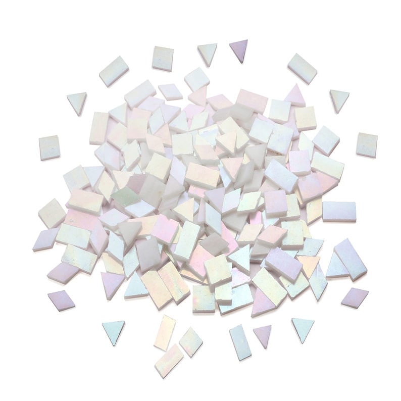 May include: A pile of iridescent white and light pink mosaic tiles in various shapes, including squares, rectangles, and triangles.