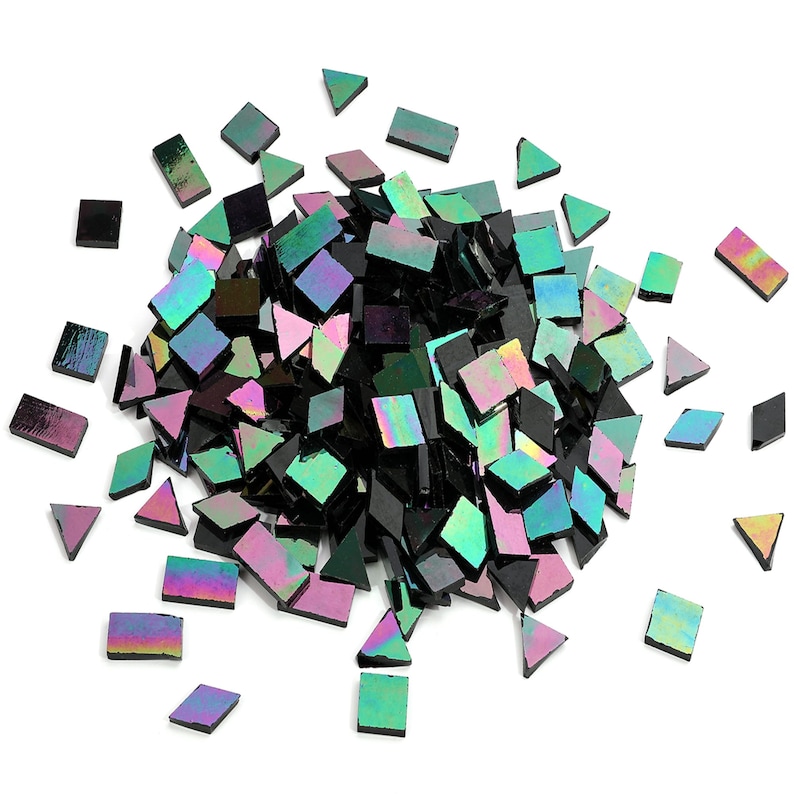 May include: A pile of iridescent black and green glass mosaic tiles. The tiles are in various shapes, including squares, rectangles, and triangles.