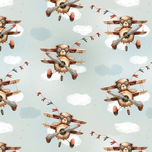 May include: Watercolor illustration of a repeating pattern featuring teddy bears piloting vintage biplanes. The planes are brown and red with silver propellers and red wheels. The background is a light blue sky with white clouds and small colorful flags.