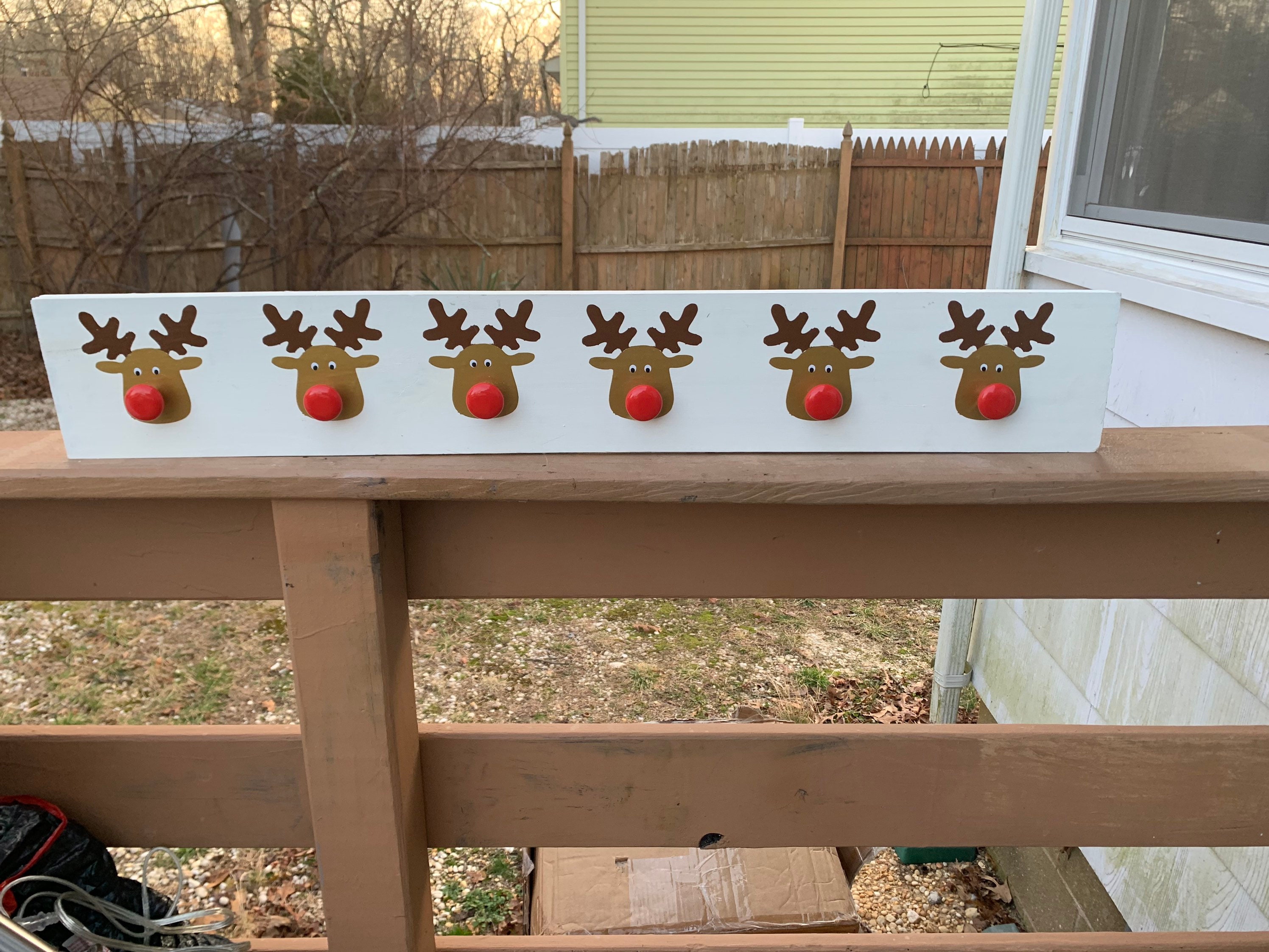 Rudolph reindeer stocking holder with red knobs Etsy