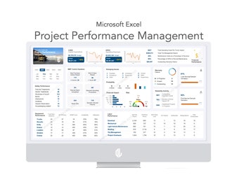 May include: A computer monitor displaying a Microsoft Excel dashboard titled "Project Performance Management." The screen shows various charts, graphs, and data tables related to project metrics, including safety, equipment, and financial performance.
