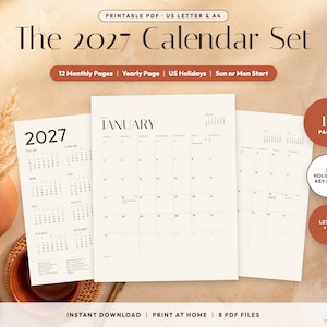 Può includere: Un set di calendario 2027 stampabile con 12 pagine mensili e una pagina annuale. I documenti includono festività statunitensi, opzioni per l'inizio della settimana di domenica o lunedì e sono in formato US Letter e A4. Il testo recita The 2027 Calendar Set.