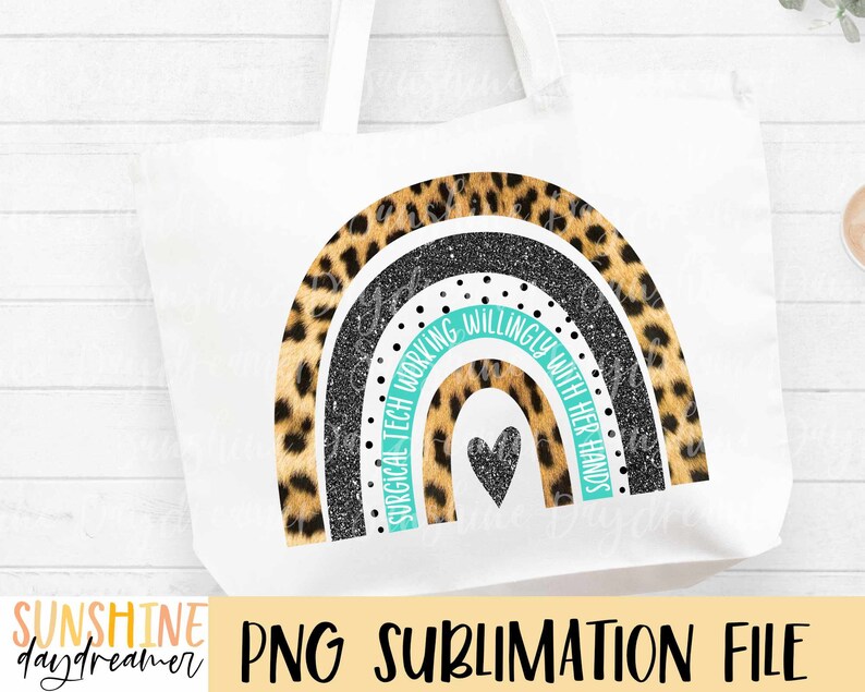 May include: A white tote bag with a sublimation design of a rainbow made of leopard print and glitter. The rainbow has the text "Surgical Tech Working Willingly With Her Hands" in turquoise.