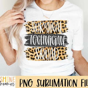 May include: White t-shirt with a leopard print design and the text "Surgical Technician Squad" in black and white.