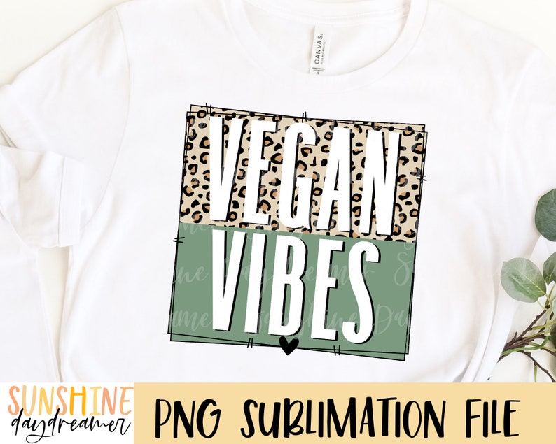 May include: A sublimation design featuring the text "Vegan Vibes" in white letters on a green background with a leopard print pattern on top.