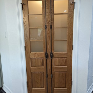 Four Lite Double Raised Panel Interior Glass Doors