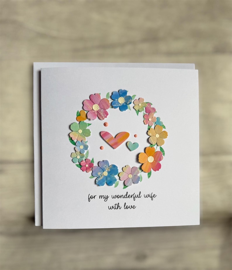 May include: A rustic wooden sign with the text "Welcome to our home" in white lettering. The sign features a distressed finish and a simple, inviting design, perfect for entryway decor.