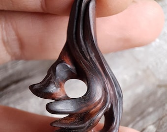 Hand-Carved Lentiscus Wood Pendant: abstract design