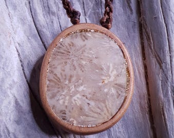 Handcarved Greek Island Coral Fossil Encased in Juniper Wood Pendant. With adjustable chord.