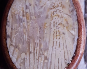 Handcarved Greek Island Coral Fossil Encased in Juniper Wood Pendant. With adjustable chord.