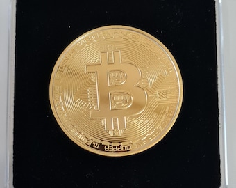 Moneda Bitcoin bañada en oro: un recuerdo y regalo para coleccionistas de criptomonedas