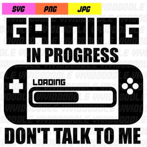 May include: Black and white graphic design with the text "Gaming in Progress" and a stylised video game controller with a loading bar that says "Loading". The text "Don't Talk To Me" is below the controller.