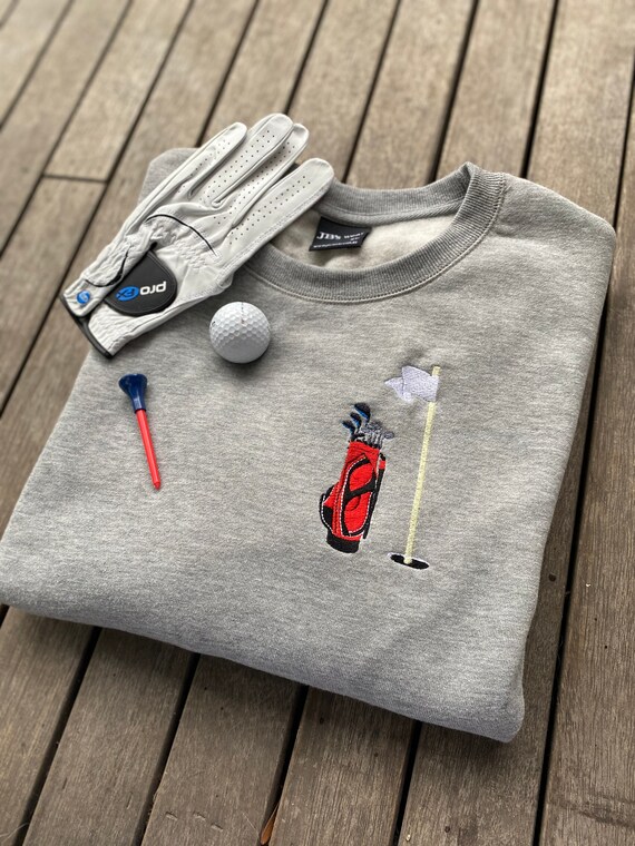 grey golf jumper
