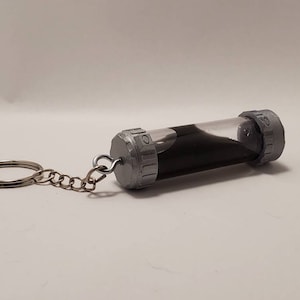 Venom Symbiote Canister keychain