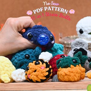 May include: A selection of handmade stress balls in a variety of colours, including blue, yellow, orange, and green. The balls are made from soft, textured yarn and have black button eyes. The image includes text that reads "No Sew PDF Pattern 15 in 1 Stress Balls."