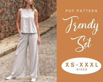 May include: A PDF pattern for a trendy set of clothing, featuring a sleeveless top and wide-leg pants. The pattern is available in sizes XS-XXXXL. The image shows a model wearing the finished garment in a light gray color.
