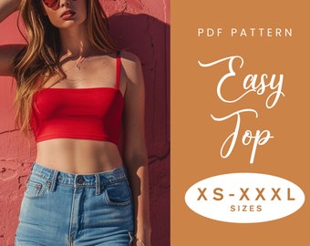 May include: PDF pattern for an easy top, with sizes ranging from XS to XXXL. The pattern is shown on a model wearing a red crop top and blue jeans against a pink wall.