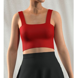 May include: A red cropped tank top with wide straps. The top is made of a smooth, stretchy fabric.