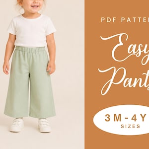 May include: A PDF pattern for easy pants in sizes 3M-4YR, featuring a white short-sleeved t-shirt and wide-leg sage green pants with an elastic waistband. The text on the right side reads PDF PATTERN Easy Pants 3 M - 4 YR SIZES.