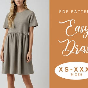 Puede incluir: Un vestido color taupe de manga corta con cintura fruncida y falda acampanada. La imagen incluye el texto "PDF Pattern Easy Dress" y "XS-XXXL SIZES". El vestido lo lleva una persona.