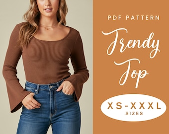 May include: A brown, long-sleeved top with a scoop neckline and flared sleeves. The top is paired with blue jeans. Text on the image reads "PDF Pattern Trendy Top" and "XS-XXXL SIZES".
