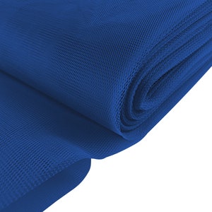 May include: A roll of royal blue tulle fabric. The fabric is soft and sheer, with a fine mesh weave.