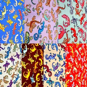 May include: A collection of fabric swatches showcasing a repeating pattern of vibrant lizards. The lizards are in shades of yellow, orange, blue, and green, set against backgrounds of blue, purple, brown, and red.