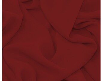 May include: A close-up of a deep red fabric with soft folds and wrinkles. The fabric has a smooth, silky texture.