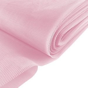 May include: A roll of pink tulle fabric. The fabric is soft and sheer, with a delicate texture.