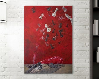 May include: Abstract red painting with chess pieces seemingly in motion. The artwork features a vibrant red background with black and white chess pieces. The painting is displayed in a modern living room setting with a white chair and a floor lamp.