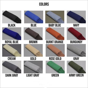 May include: A color chart showing 16 different colors of scarves with fringe. The colors are: black, blue, baby blue, navy, royal blue, brown, burnt orange, burgundy, cream, gold, rose gold, gray, dark gray, light gray, green, and army green.