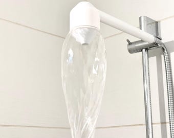 Magnetische douchekop voor gestructureerd en roterend water.