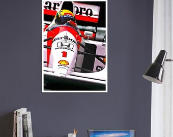 May include: A framed poster of a Formula 1 race car, featuring the Marlboro and Honda logos. The car is white and red, with the number 1 prominently displayed. The driver is wearing a helmet. The poster is hanging on a dark blue wall.