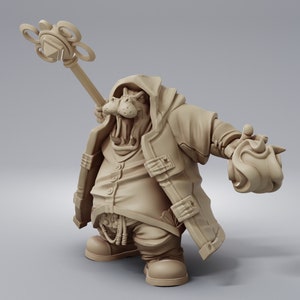 May include: A brown, cartoonish figurine of a hippopotamus wearing a hooded jacket and holding a staff with a star-shaped top. The hippopotamus has a wide open mouth and appears to be casting a spell.