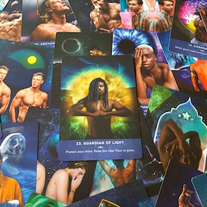 May include: A tarot card with a blue background and a yellow sun. The card is titled "23. Guardian of Light" and has the text "Protect your shine. Raise the vibe. Flow to grow."