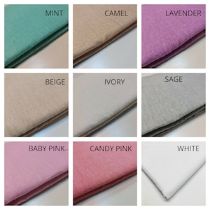 May include: Nine fabric swatches in various colors, including mint, camel, lavender, beige, ivory, sage, baby pink, candy pink, and white. The swatches are folded and arranged in a grid pattern.