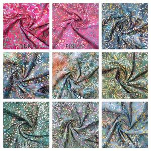 May include: Nine fabric swatches in various colors and patterns, including pink, green, blue, and multi-colored. The swatches are arranged in a 3x3 grid, with each swatch labeled with its color or pattern name.