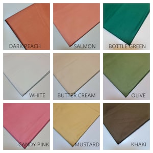 May include: Nine fabric swatches in various colors, including dark peach, salmon, bottle green, white, butter cream, olive, candy pink, mustard, and khaki.