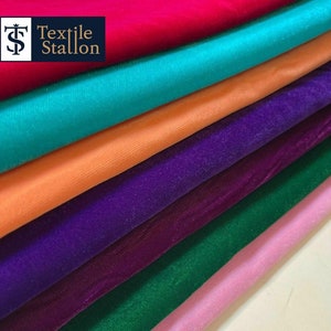 May include: A stack of fabric swatches in various colors, including red, turquoise, orange, purple, burgundy, green, and pink. The fabric swatches are arranged in a staggered pattern, with the red swatch on top. The text "Textile Stallion" is visible on the top swatch.
