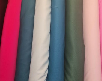 Tessuto per abito in jersey di crêpe scuba elasticizzato, tinta unita, 58 pollici al metro