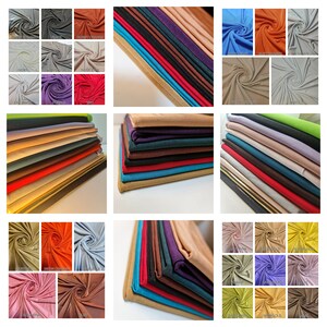 May include: A collection of 24 different colours of jersey knit fabric. The fabric is arranged in stacks of 10-12 pieces each. The colours include: white, light grey, dark grey, silver, light brown, brown, dark brown, red, orange, yellow, green, teal, blue, light blue, purple, pink, magenta, and black.