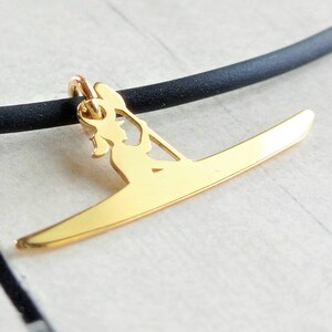 925 Sterling Silver canoe necklace with 18 carat gold plating · Rubber necklace with gold canoe · Discovering the river...