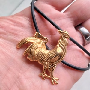 Golden rooster pendant with black natural rubber necklace