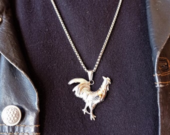 Steel rooster pendant ·  Rooster pendant · Rooster necklace · Totem pendant · Rooster warming in the sun.
