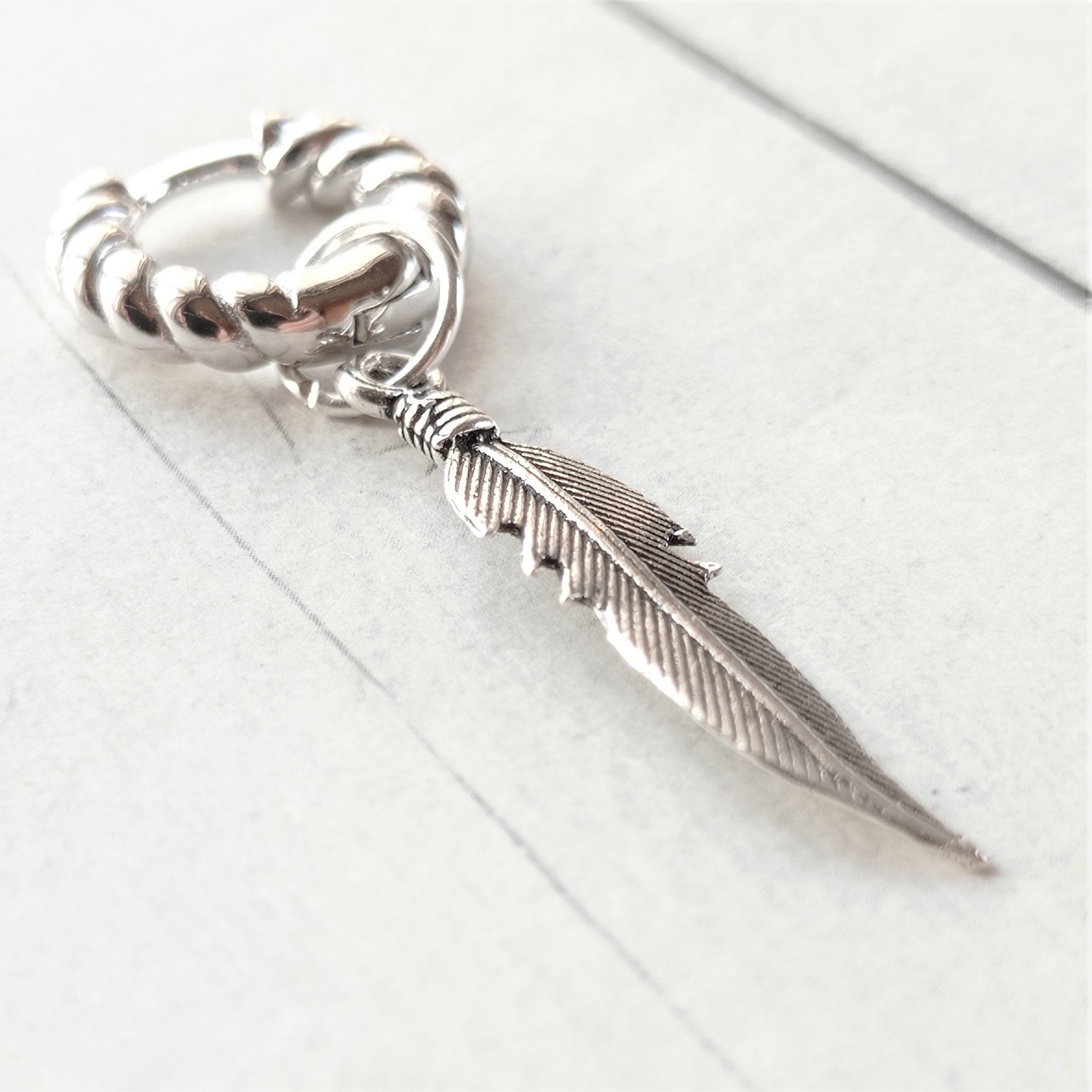Orecchini a cerchio con piuma in argento 925 - ame jewels